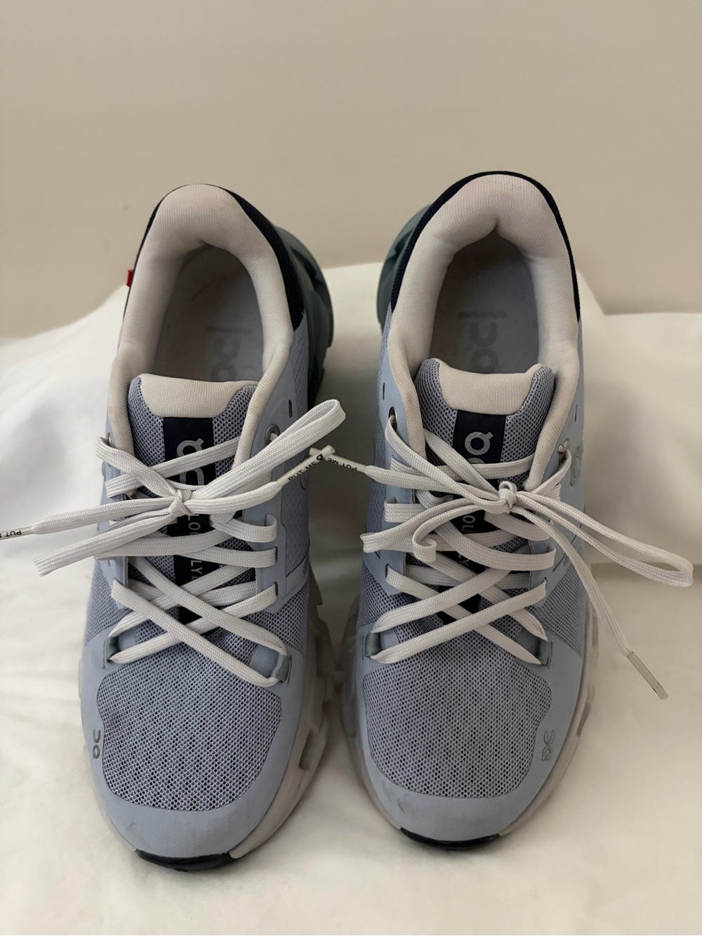 On Running Light Blue and White Women's Athletic Sneakers